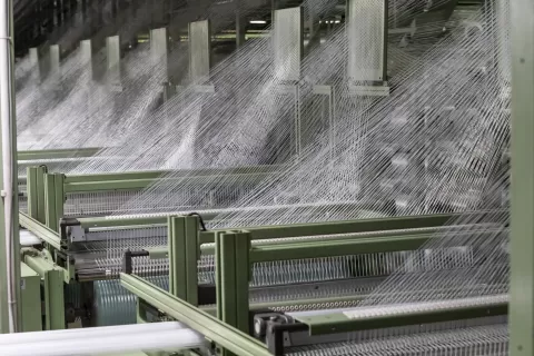 Airbag webbing and weaving