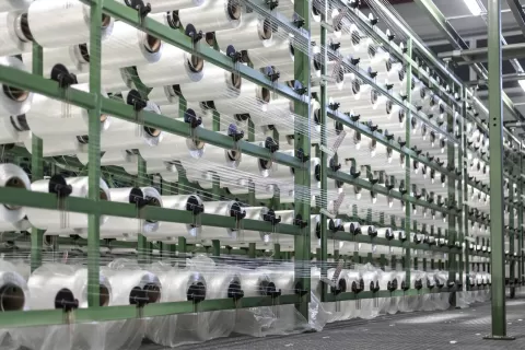 Airbag webbing and weaving