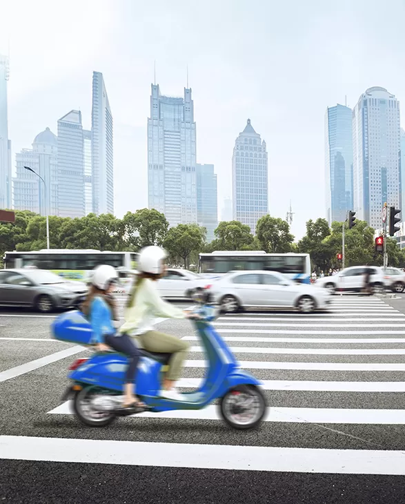 Two persons on a bike