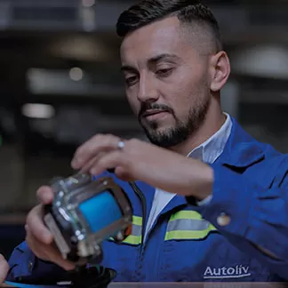 Employee working on seatbelt