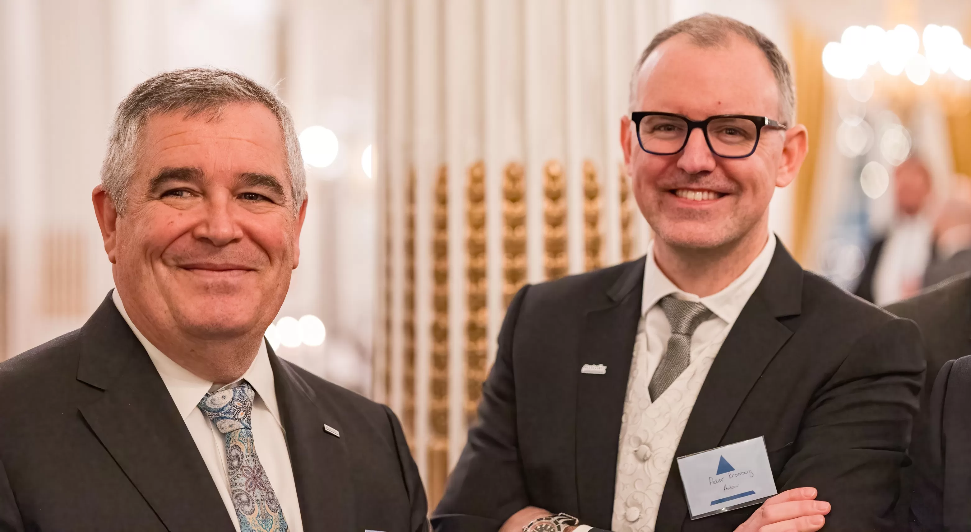 Two men smiling at the awardshow
